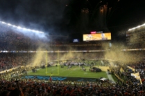 Both teams along with media rush onto the field post game as confetti and fireworks fill the sky. The Denver Broncos are Super Bowl 50 champions